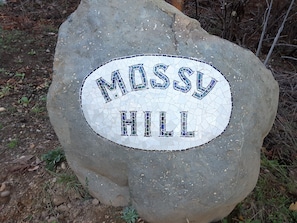 Your driveway has this Mossy Hill mosaic sign just past the 160 Donore driveway.