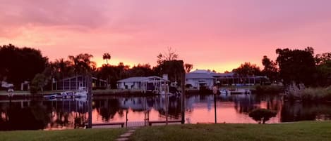 Relax to an amazing sunset over the lagoon from the large screened in lanai