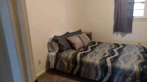 Bedroom two includes a queen size bed.