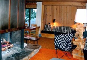 The living room and Fieldstone fireplace...ahhhh cozy...warm!