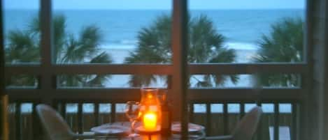 Enjoy the sound of crashing waves as you enjoy dinner on the screened porch.