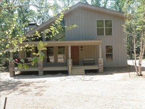 FRONT ELEVATION FROM FOX CHASE ROAD ON EDEN ISLE IN HEBER SPRINGS, ARKANSAS