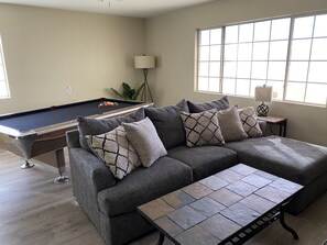 Game Room with New section chaise lounge sofa, comfy and cozy. 