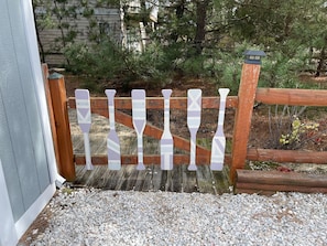 New pastel colored oars decorate the gate.