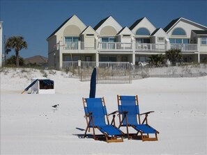 Step out your back door and relax on the beach!
