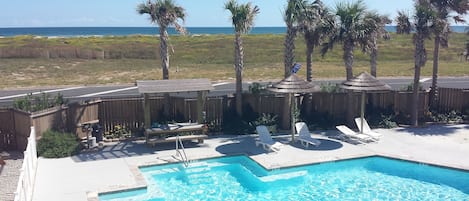 Beautiful view of pool and ocean from second floor balcony.