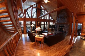 Main Level Living Room, big windows over looking the lake 