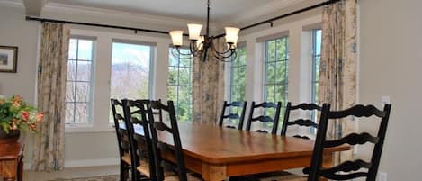 dining room with a view of the mountain