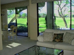 Open living area with plenty of light and sliding doors to the golf course.