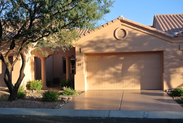 Front of house and garage entry