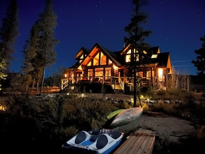 View of house from the beach at night