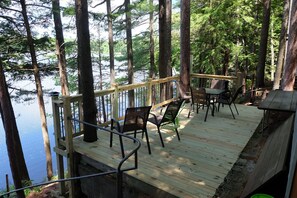 New deck, railing, and outdoor furniture.