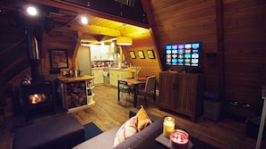 living area with TV on night