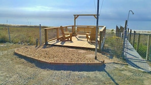 Beachfront deck, wood adirondacks, swing, shower, private boardwalk!