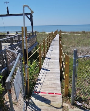 Private beach boardwalk! Rinse off upon entering the yard!