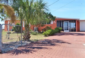 Completely fenced and gated property with wide driveway.