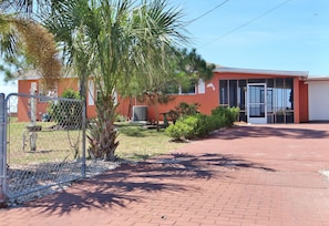 Completely fenced and gated property with wide driveway.