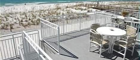 Main Deck, Table, Chairs, & Umbrella, Lounge, and Plenty of Stackable Chairs