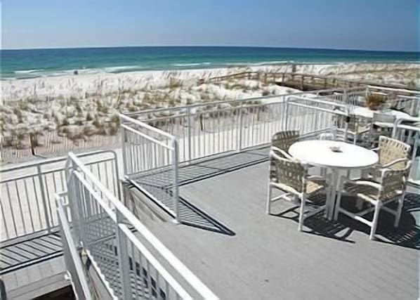 Main Deck, Table, Chairs, & Umbrella, Lounge, and Plenty of Stackable Chairs