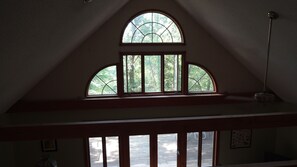 cathedral ceiling and windows let in fresh air, great views, and keep it cool