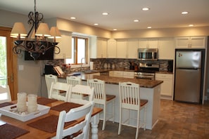 Beautifully renovated kitchen/dining area; plenty of counter space, storage, etc