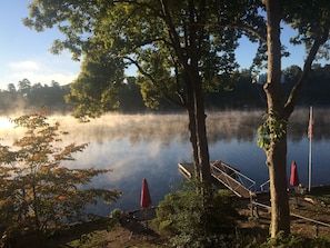 Misty lake sunrise