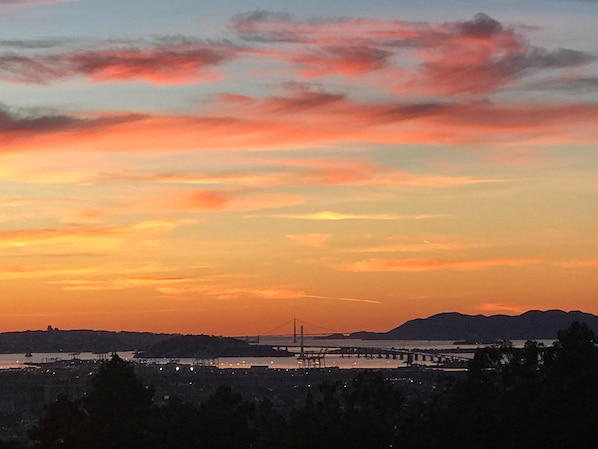 Amazing sunsets! View of Bay Bridge w/Golden Gate behind.
