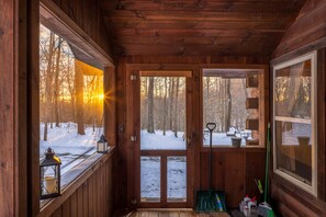 Relax on the screened-in porch at sunrise or sunset!