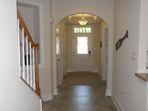 Looking at front door from kitchen.