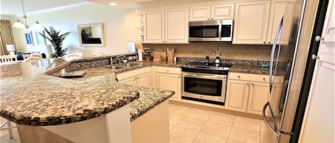 Newly renovated kitchen equipped with all amenities for preparing full meals