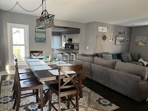 Open concept dining/living room when plenty of seating for the family. 