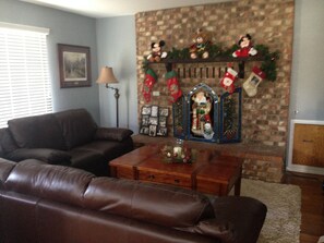 Living Room on main floor with fireplace. 
