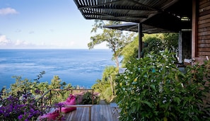 The sundeck is down a few steps from the main living area in The Lodge