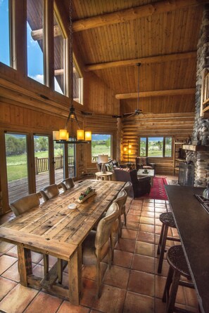 Dining room with views of the Yellowstone River and all mountain ranges. 