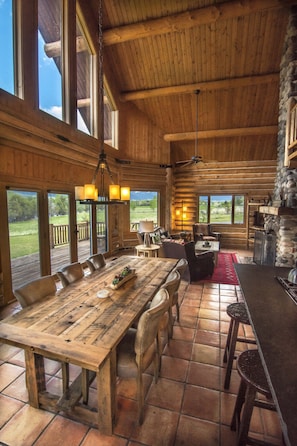 Dining room with views of the Yellowstone River and all mountain ranges. 