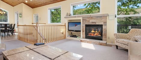 Main Living Room with gas fireplace and big screen TV for after skiing!