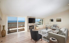 View entering the Living Room area & sliding door to the Ocean view Deck !