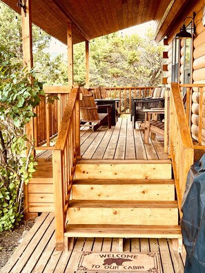 Gather on the Front porch with chairs around the fire pit! The perfect evening. 
