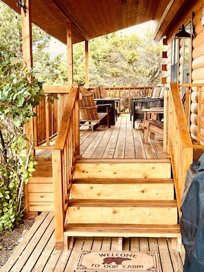 Gather on the Front porch with chairs around the fire pit! The perfect evening.