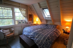 Upstairs king bedroom. Bell buoy marking Menemsha harbor lulls you to sleep