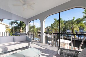 Upstairs screened-in porch