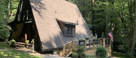 The Sunburst A-Frame Cabin tucked in the woods!