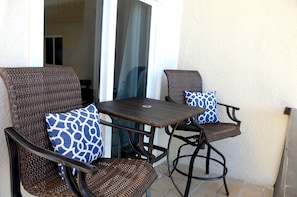 Patio chairs for relaxing on the balcony.