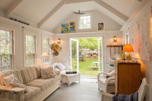 Sunroom off of the kitchen with view of garden and Baa Boys pen..