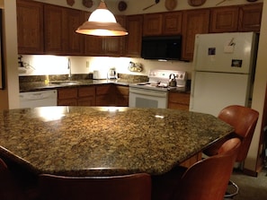 Kitchen granite eating area seats 8