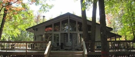 View of house and large deck.