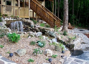 Waterfall and upper patio with firepit