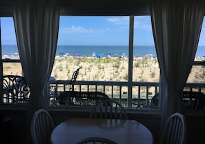 View of beach and ocean from living room window