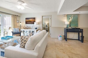 Living Area with HD Smart TV and view to the Primary Bedroom Suite