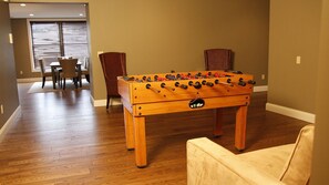 Entryway with foosball table and sleeper sofa